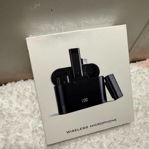 Sleek Black Wireless Microphone with Charging Case